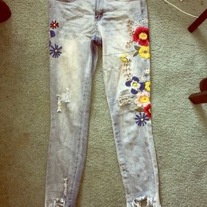 Used floral-print distressed ankle jeans